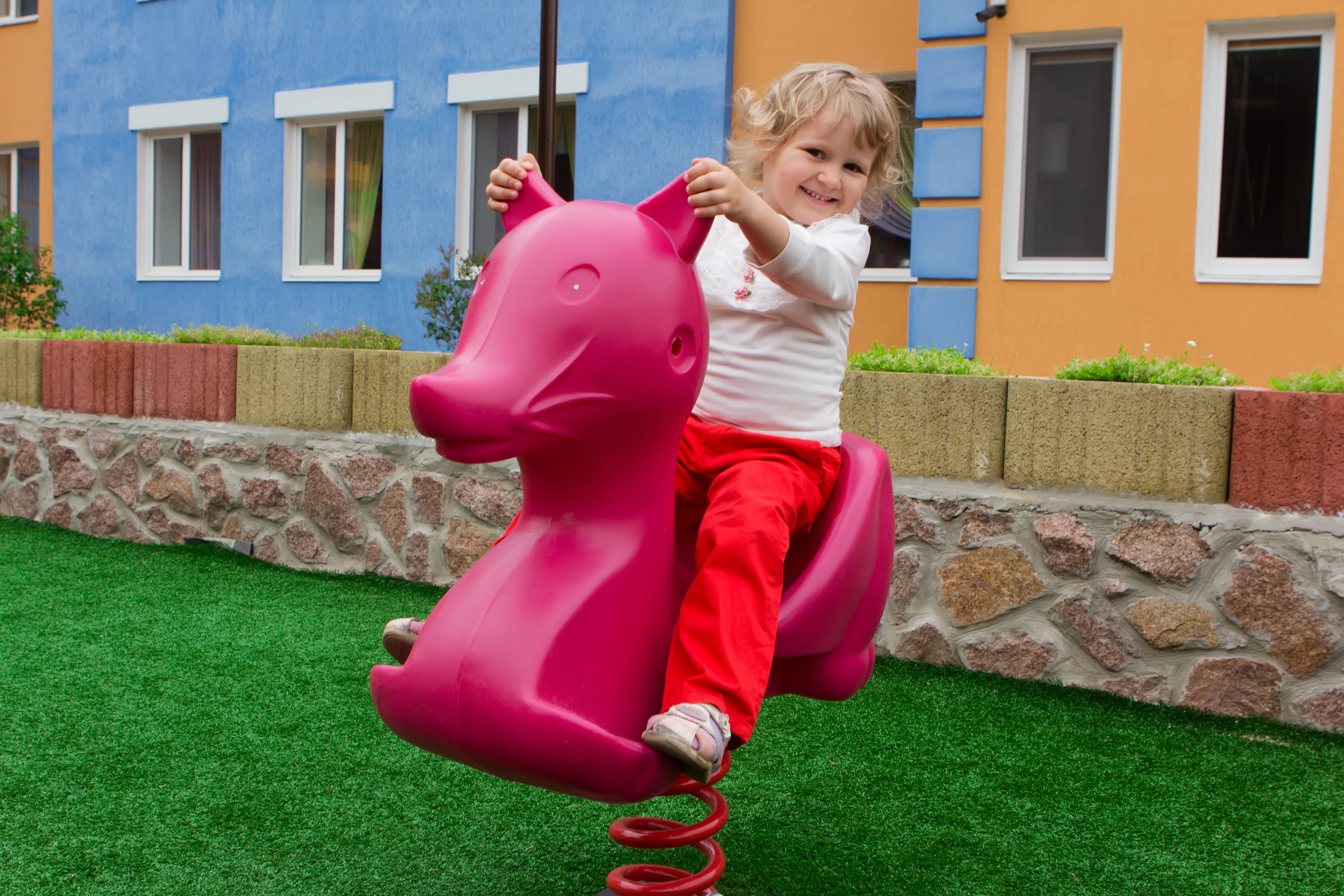 blond,girl,playing,on,playground